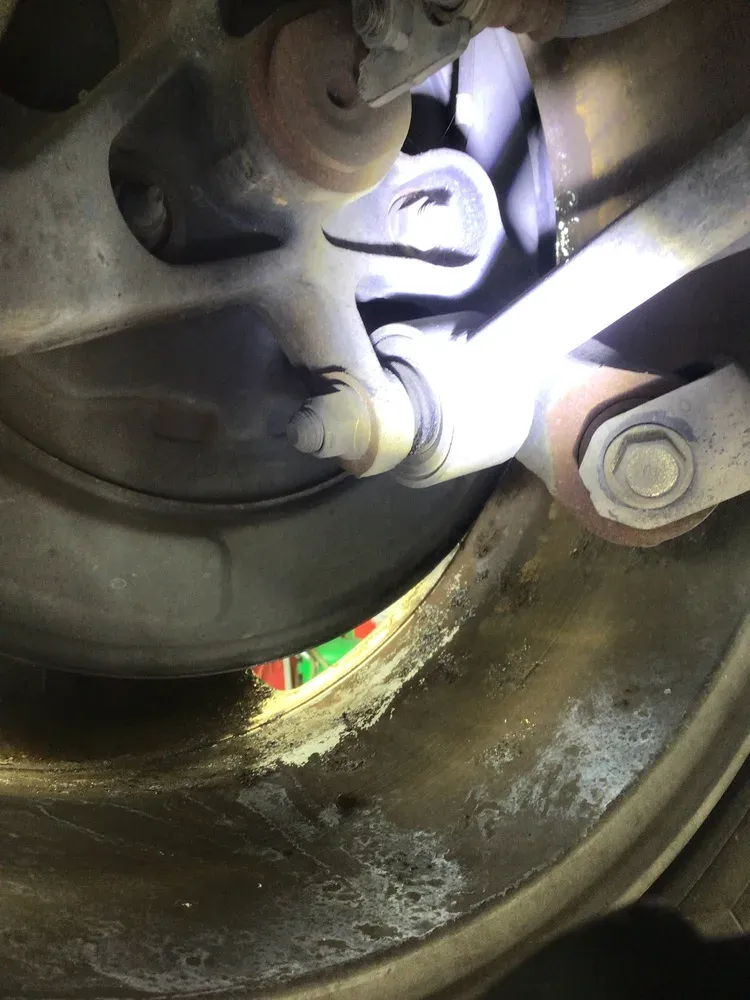 Torn control arm bushing — clunk on rough roads