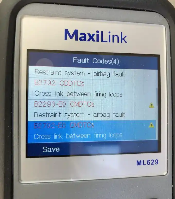 Fault codes being read on a scan tool in the bay at Beacon Auto Care San Mateo